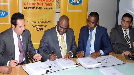 (L-r): Issam Darwish, group CEO, IHS Holding Limited, Michael Ikpoki, chief executive officer, MTN Nigeria, Akinwale Goodluck, corporate services executive, MTN Nigeria, and Rajiv Jaitly CEO, IHS Nigeria, during the MOU signing ceremony between MTN Nigeria and IHS Holding Limited over the outsourcing of MTN Nigeria's mobile network towers.